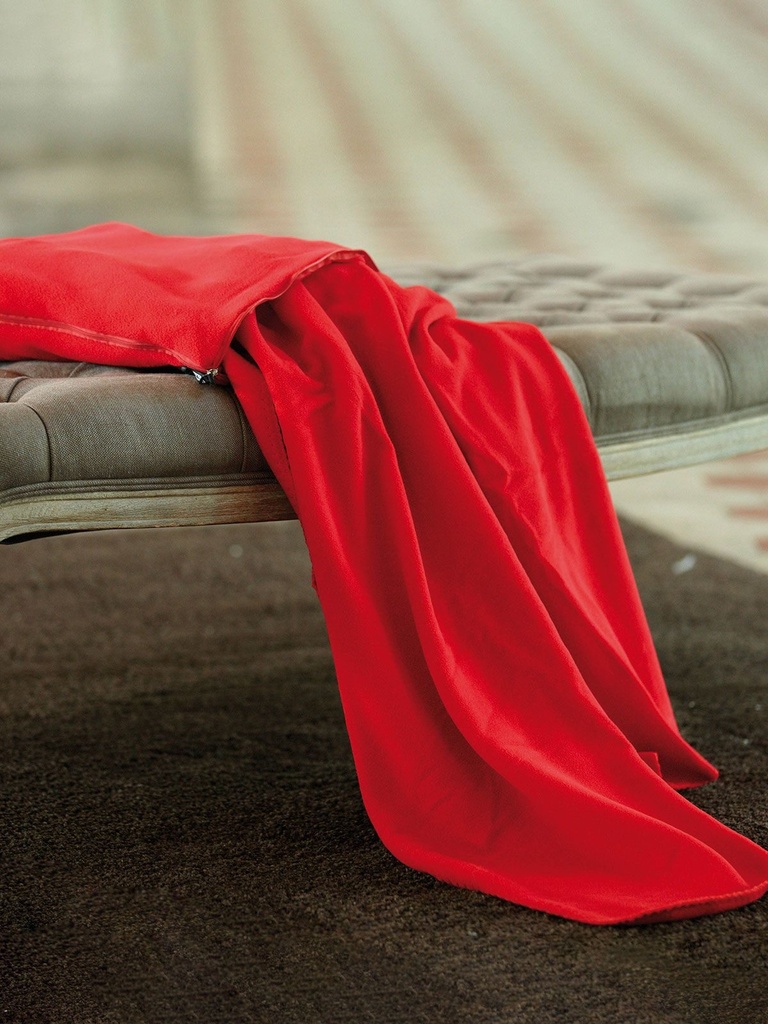 Coperta in microfleece con cuscino integrabile